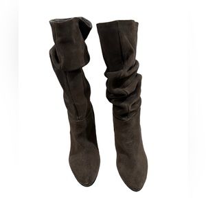 Dark brown high heel suede boots.